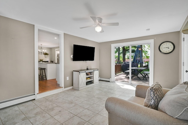 4 Sparkle St, Enfield, CT 06082 - living area featuring light tile patterned floors, ceiling fan, baseboard heating, and a chandelier