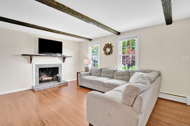 4 Sparkle St, Enfield, CT 06082 - living area featuring beam ceiling, wood finished floors, a fireplace, baseboard heating, and baseboards