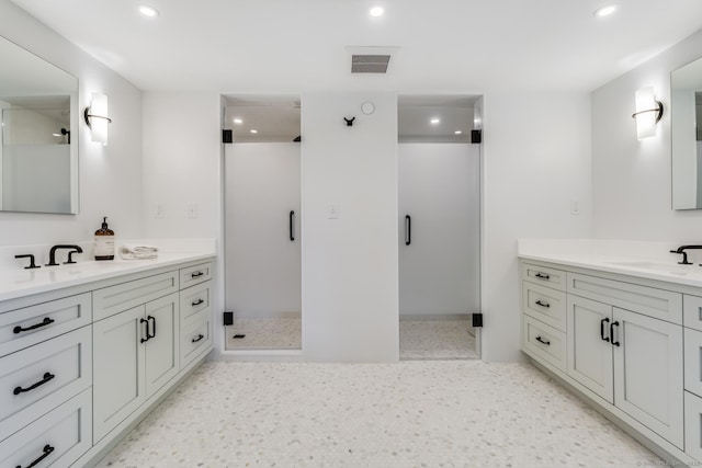 bathroom with vanity and walk in shower