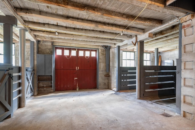 miscellaneous room with beam ceiling and wooden ceiling