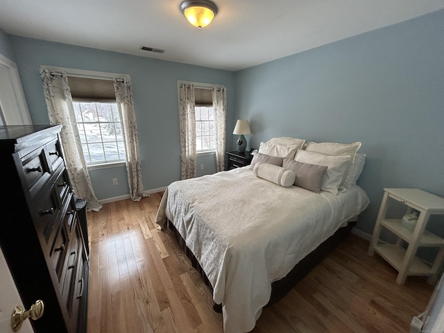 bedroom featuring hardwood / wood-style flooring