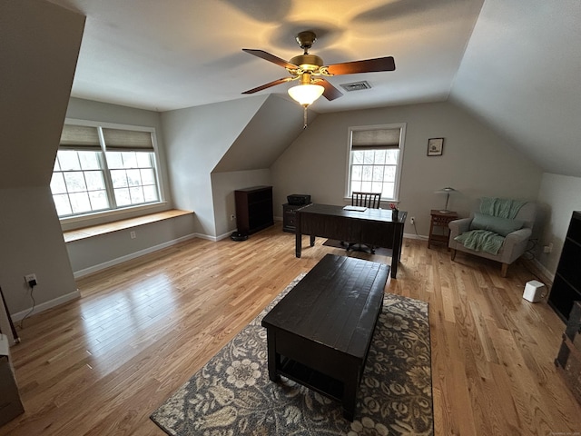 additional living space featuring vaulted ceiling, light hardwood / wood-style floors, and ceiling fan