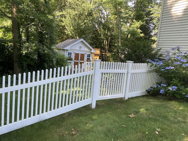 exterior space featuring a shed and a lawn