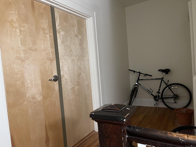 bathroom with hardwood / wood-style floors