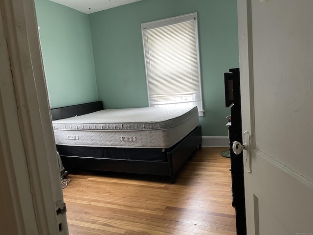 bedroom featuring light wood-type flooring