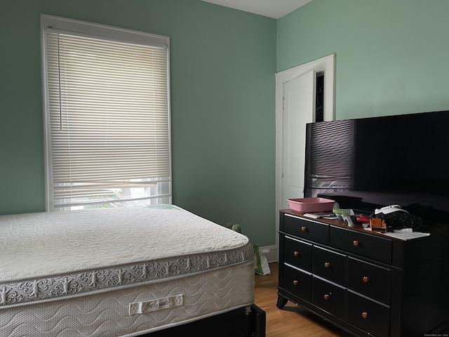 bedroom featuring light wood-type flooring