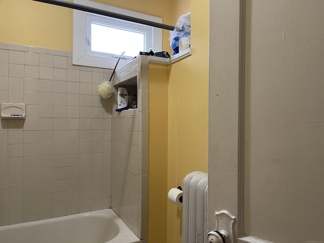 bathroom with radiator heating unit