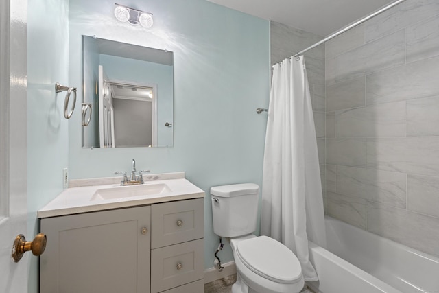 full bathroom with shower / bathtub combination with curtain, vanity, and toilet