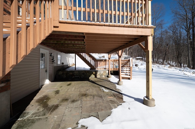 view of snow covered patio