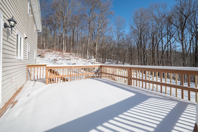 view of snow covered deck