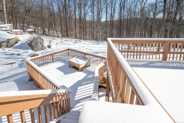 view of snow covered deck