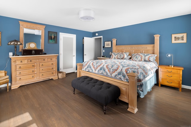 bedroom featuring dark hardwood / wood-style floors