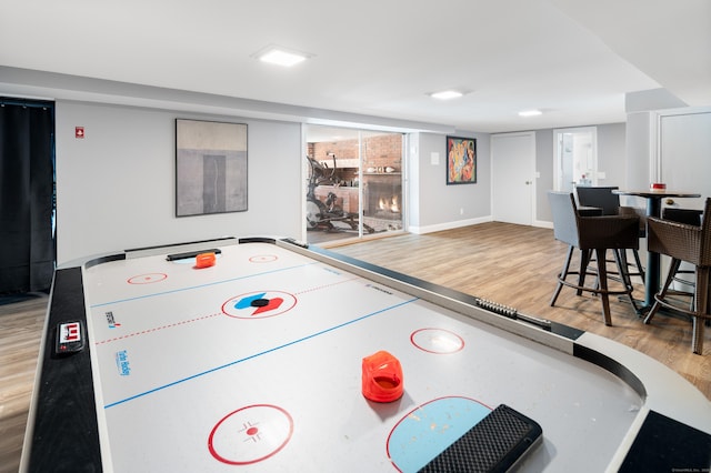 playroom featuring wood-type flooring