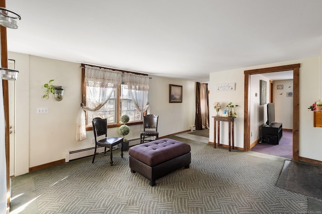 living area featuring dark carpet and a baseboard radiator