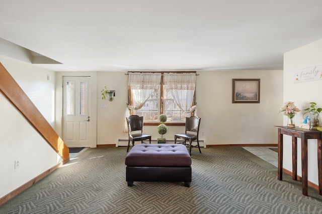 sitting room featuring dark colored carpet