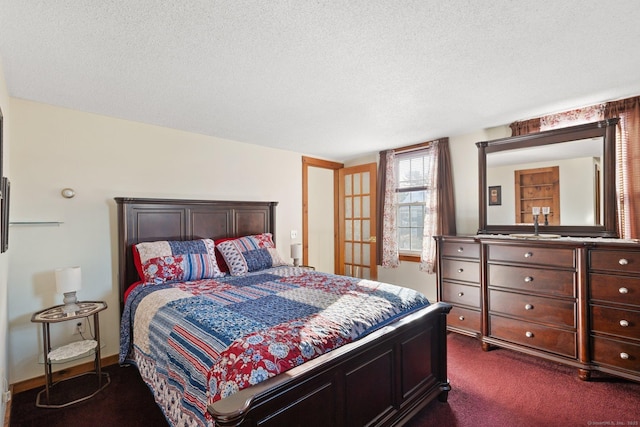 carpeted bedroom with a textured ceiling