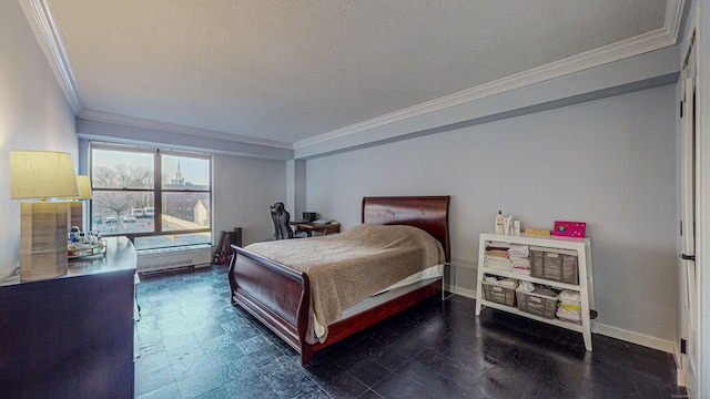 bedroom featuring crown molding and a textured ceiling