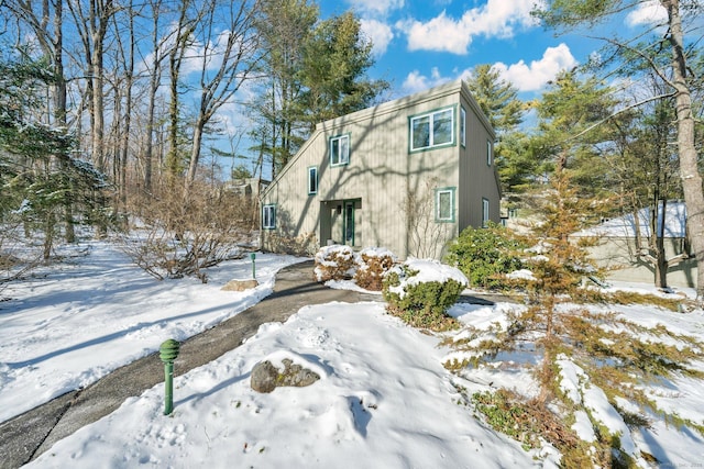 view of snow covered property