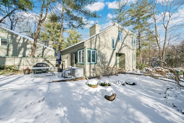 view of snow covered property