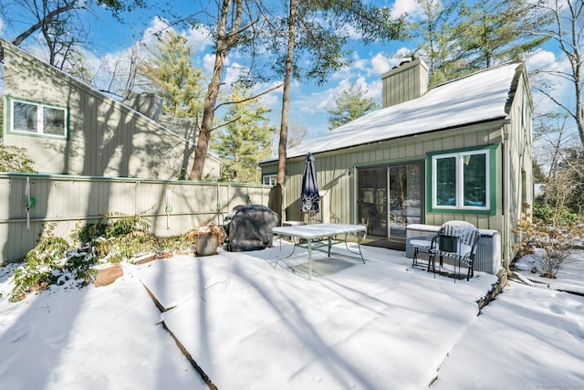 view of snow covered patio