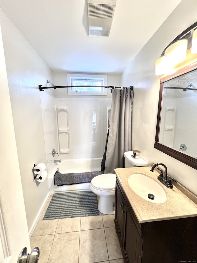 full bathroom with tile patterned flooring, vanity, toilet, and shower / bath combo