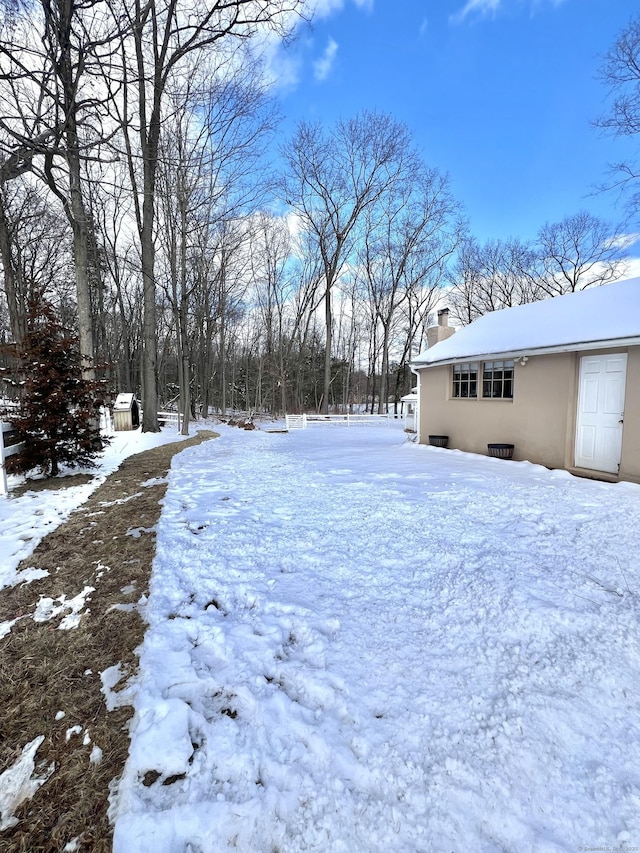 view of snowy yard