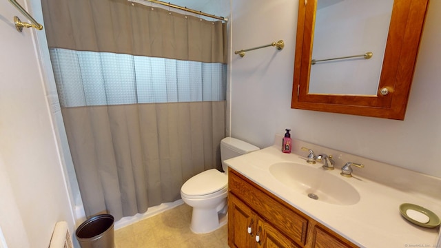 bathroom featuring vanity, toilet, and a shower with shower curtain