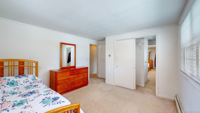 bedroom with light carpet, a closet, a baseboard heating unit, and crown molding