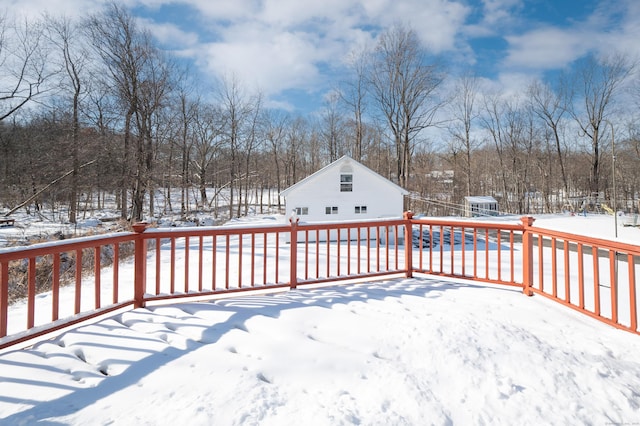 view of snow covered deck