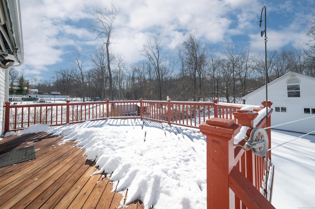 view of snow covered deck