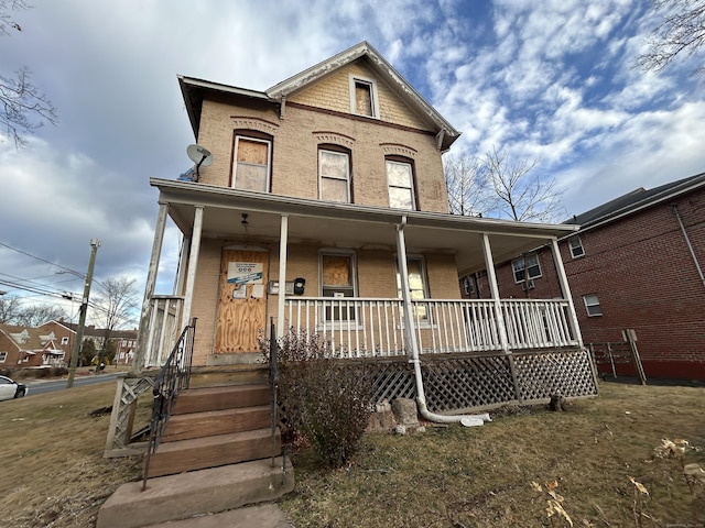 view of front of home featuring covered porch