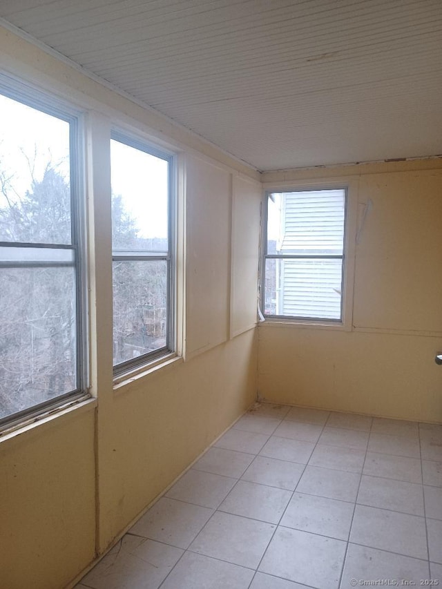 spare room with light tile patterned floors