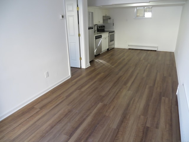 interior space featuring a baseboard radiator and dark hardwood / wood-style floors