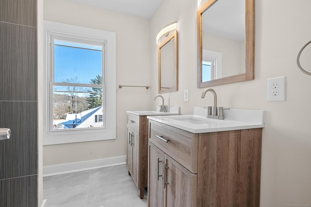 bathroom with vanity and tile patterned flooring