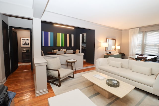 living room with light hardwood / wood-style flooring