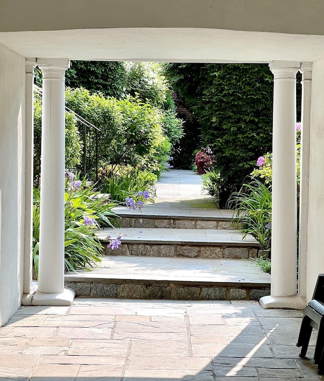 exterior space featuring ornate columns