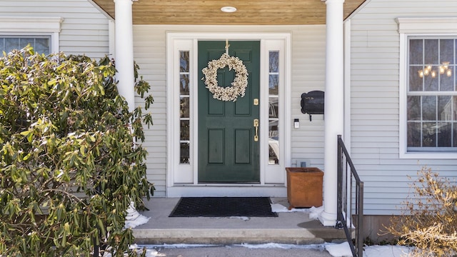 property entrance with covered porch