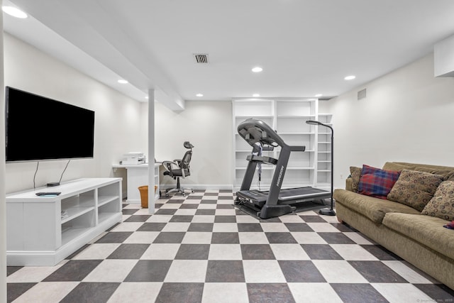 exercise area with baseboards, tile patterned floors, visible vents, and recessed lighting