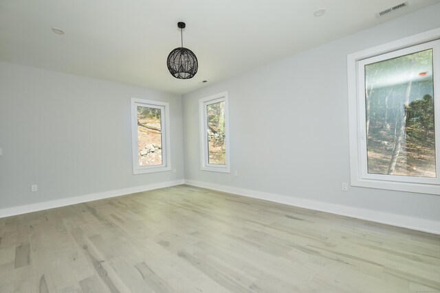 1240 Westport Tpke, Fairfield, CT 06824 - unfurnished room featuring baseboards, light wood finished floors, and visible vents