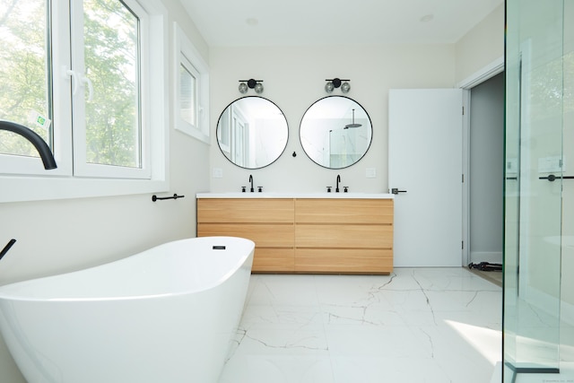 1240 Westport Tpke, Fairfield, CT 06824 - bathroom with double vanity, marble finish floor, and a wealth of natural light