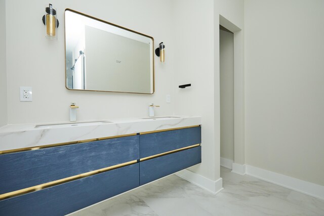 1240 Westport Tpke, Fairfield, CT 06824 - bathroom with baseboards, a sink, and marble finish floor