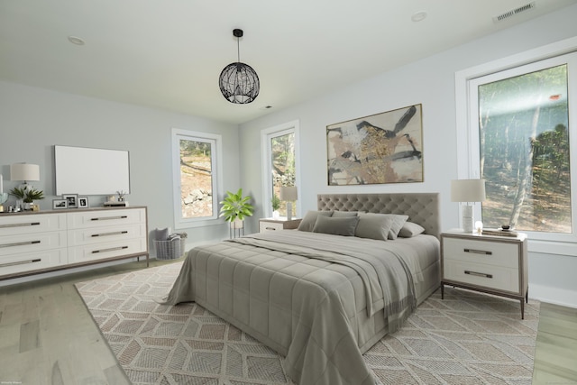 bedroom featuring light hardwood / wood-style floors