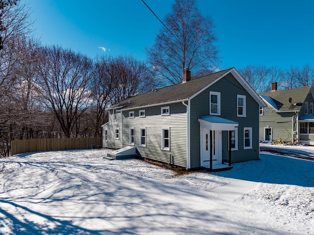 view of snow covered property