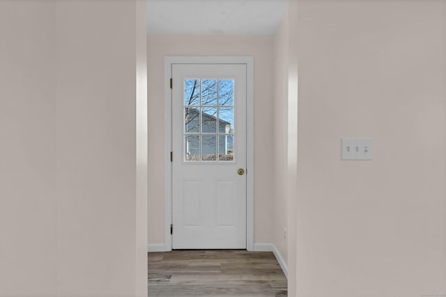 doorway to outside featuring light wood-type flooring