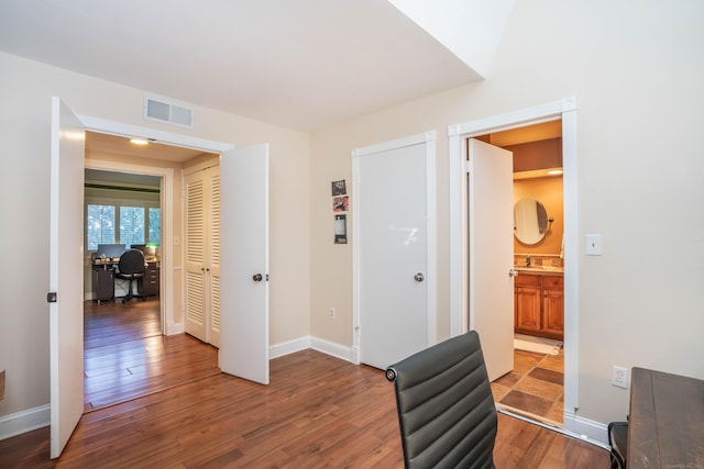 hallway featuring wood-type flooring