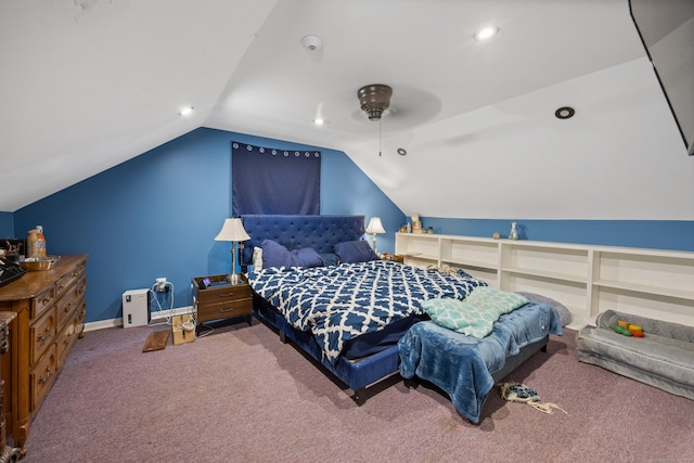 carpeted bedroom with vaulted ceiling and ceiling fan