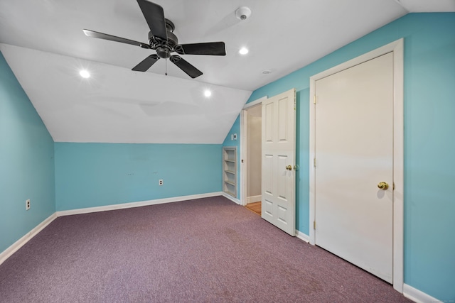 bonus room featuring lofted ceiling, carpet floors, and ceiling fan