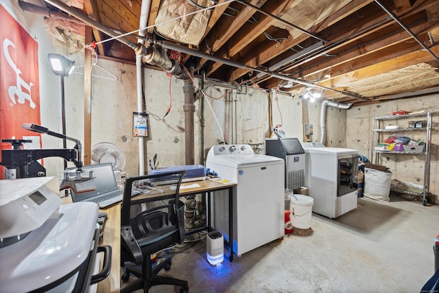 basement featuring washing machine and clothes dryer