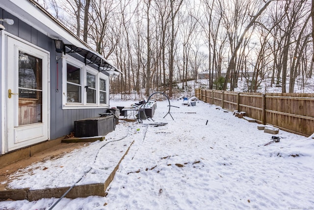 view of yard covered in snow