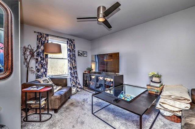 living room with carpet flooring and ceiling fan